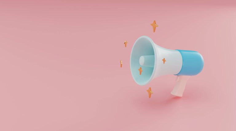 Naming your services on your website. Image of a megaphone against a pink background